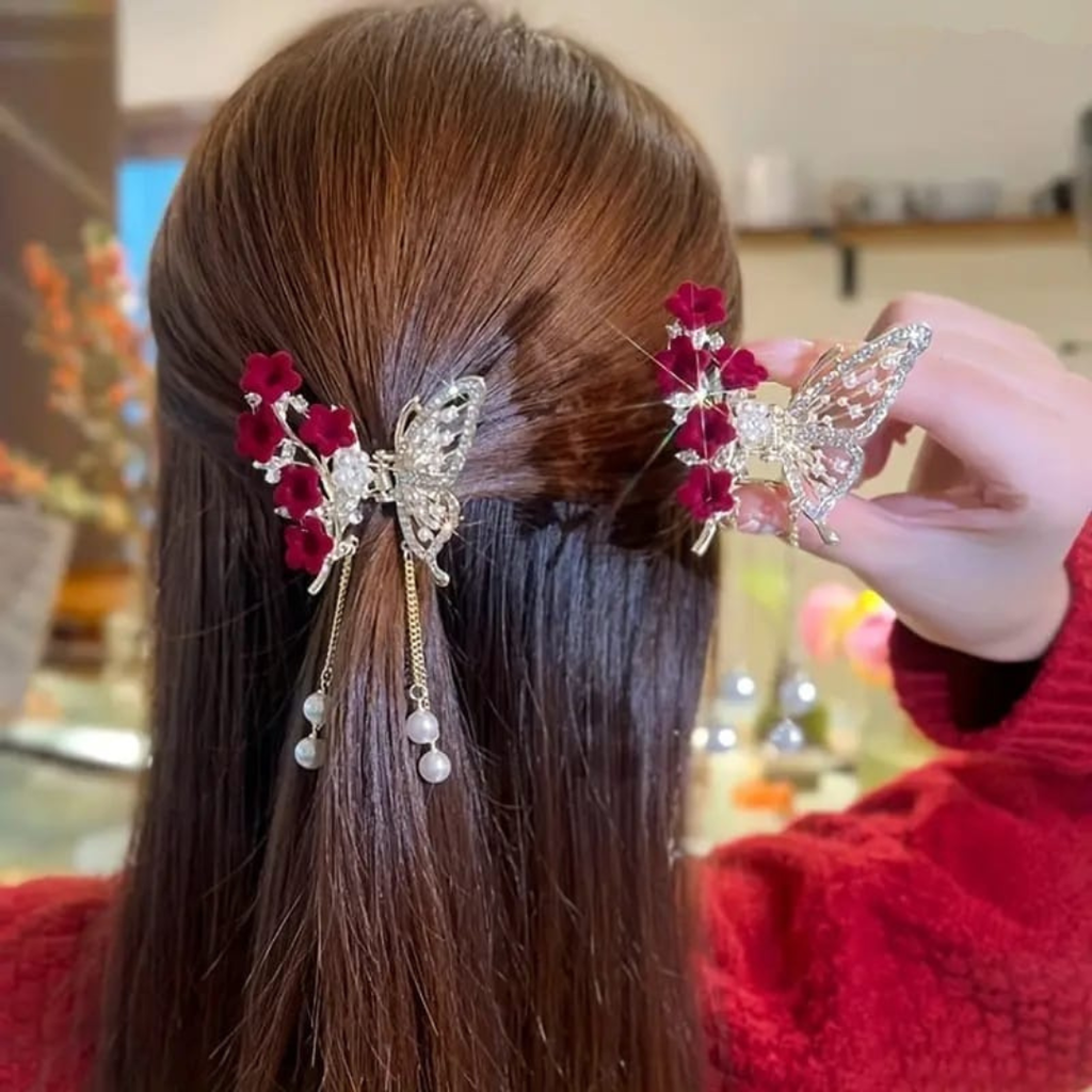 Butterfly metal clutcher